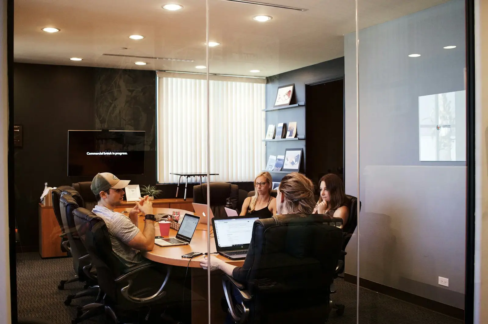 CRF Advisors team meeting in a boardroom