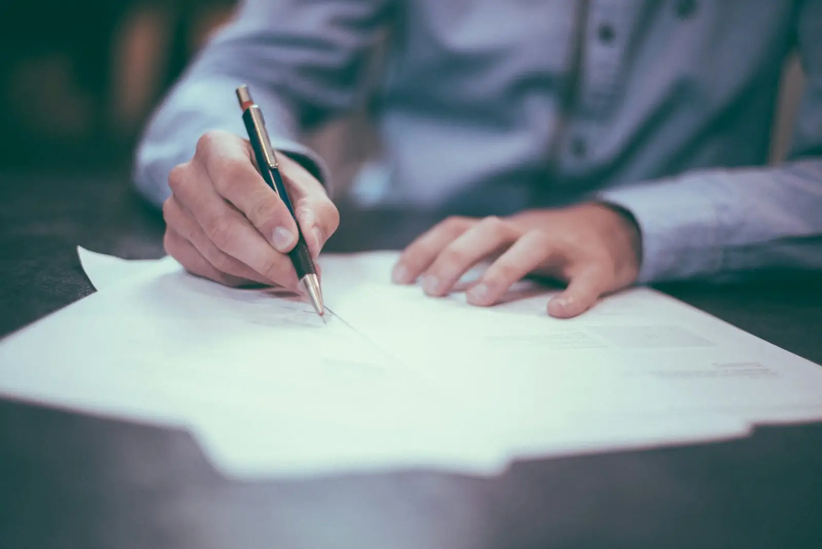 Signing a transaction agreement, representing credit due diligence for mergers, acquisitions, and portfolio purchases